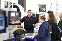 Image of family visiting Machining Technologies Lab