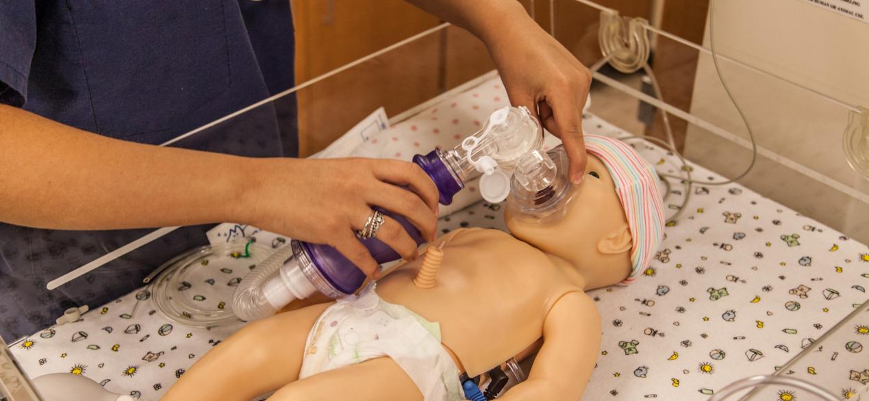 Image of student practicing pediatric nursing skills