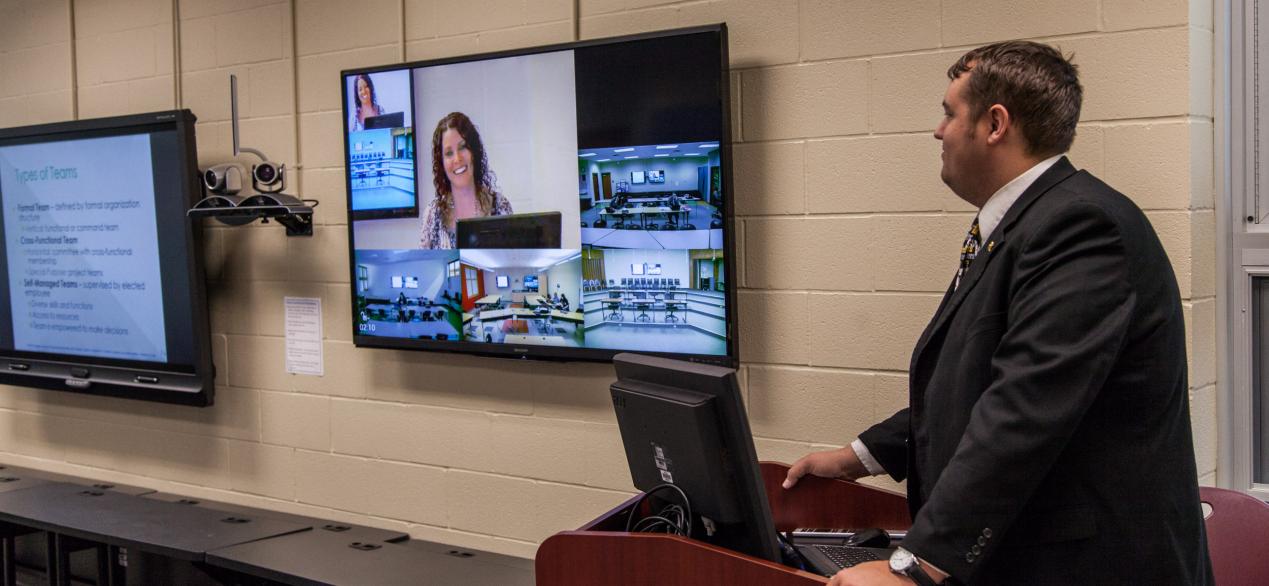 Image of front screens of what the distance learning classroom looks like