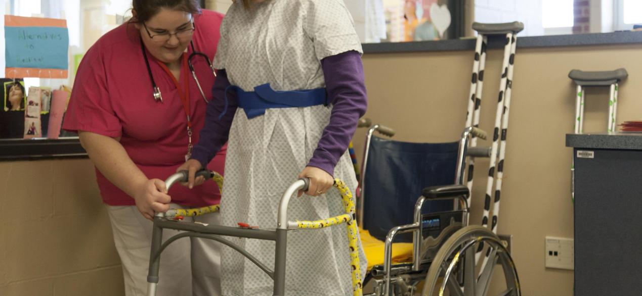 Image of student practicing geriatric nursing skills 