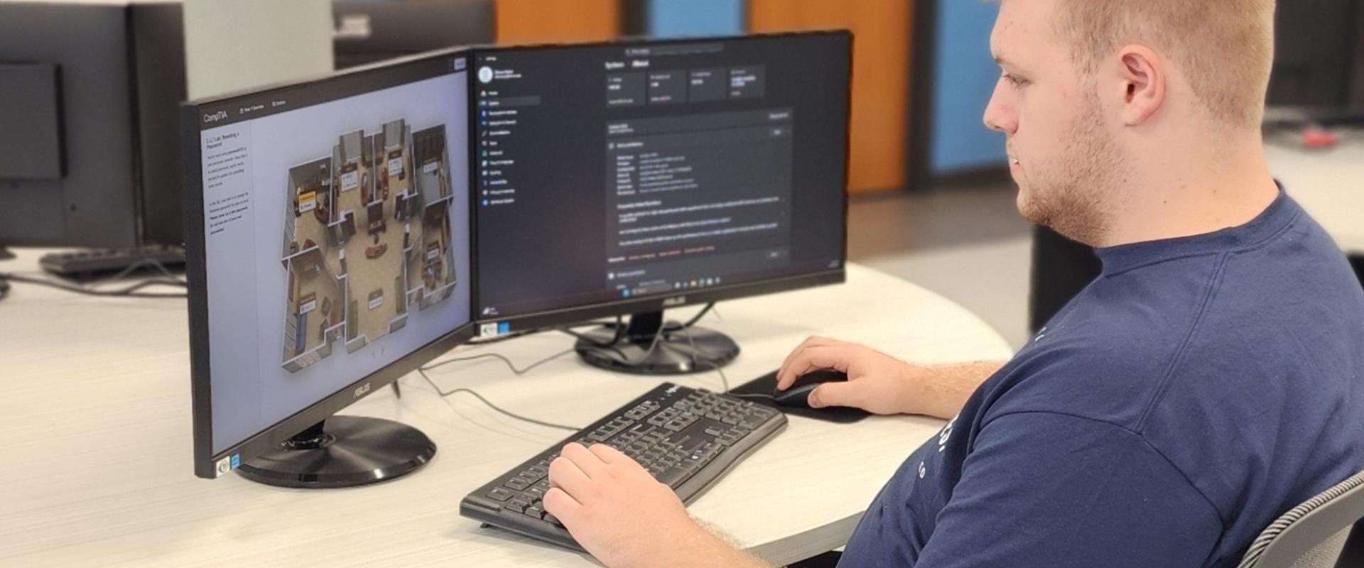 Cybersecurity student in class