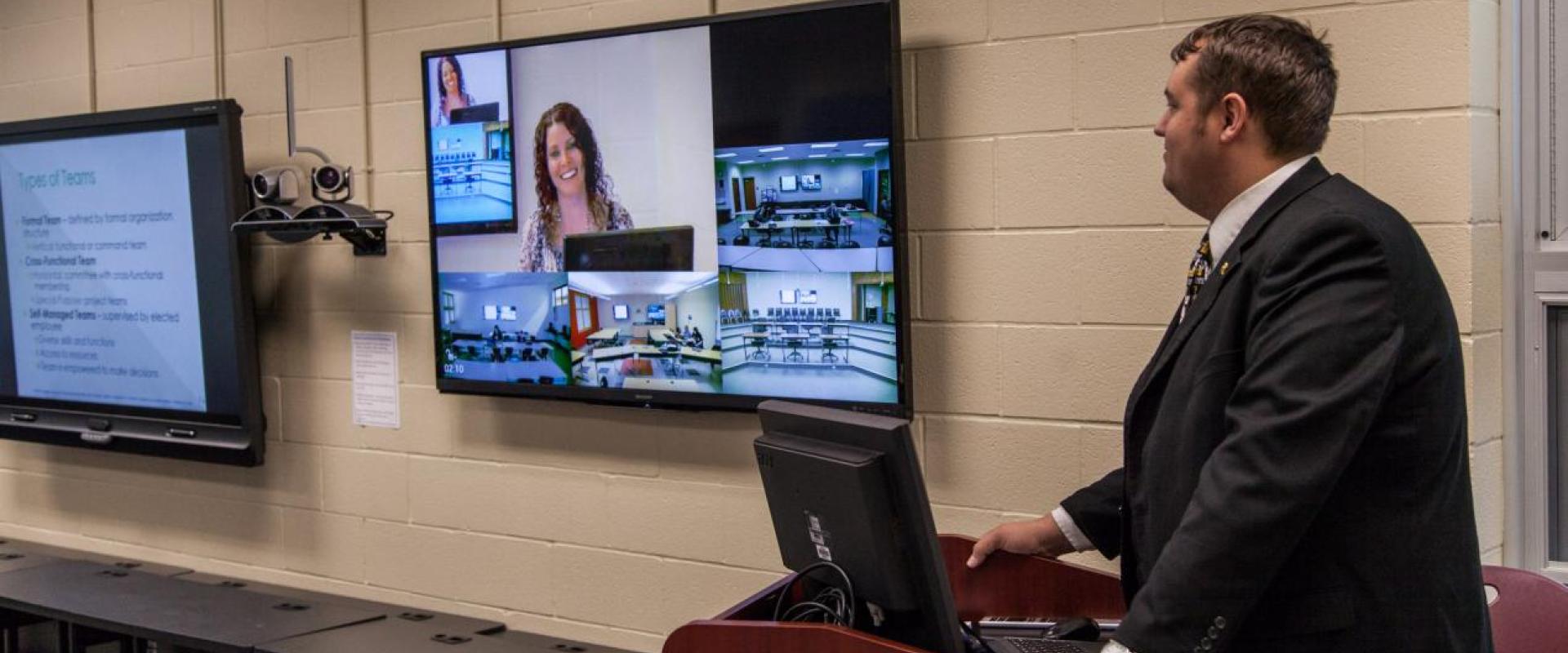 A teacher at a webcam 