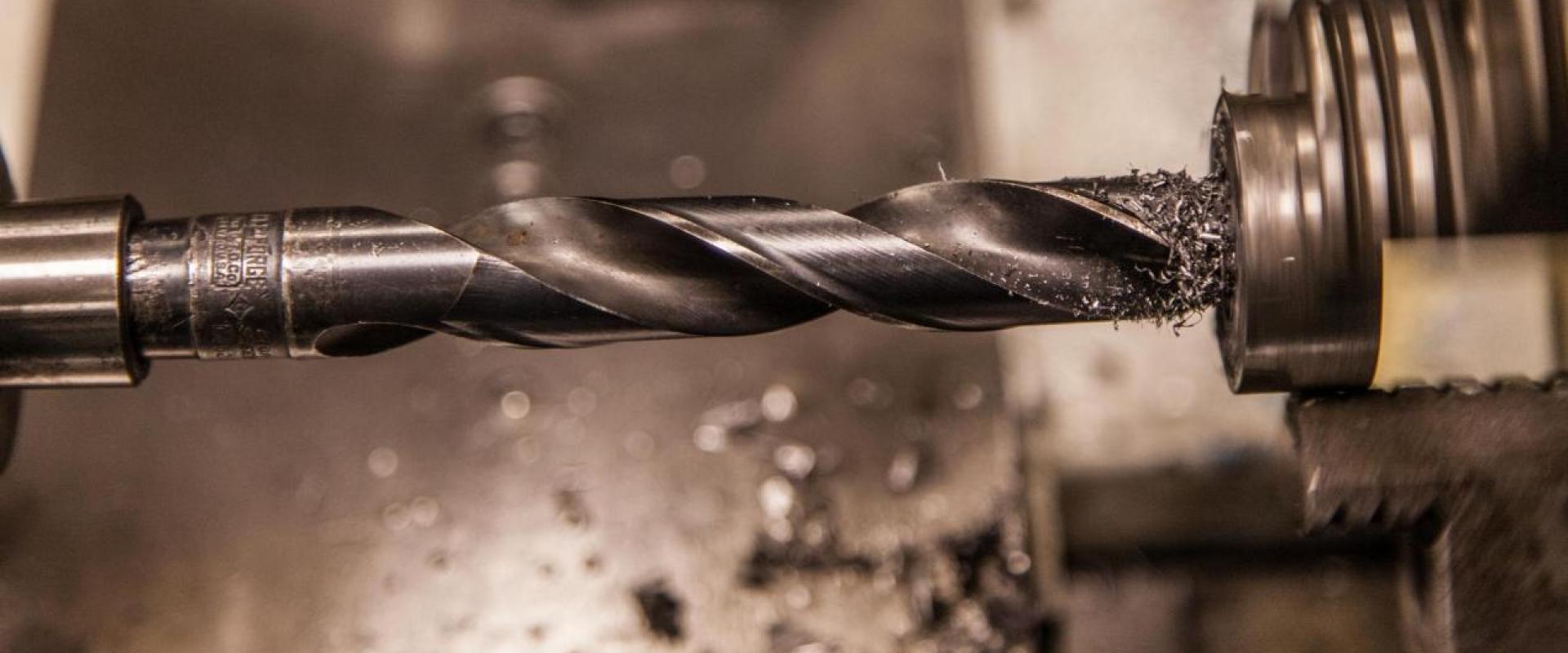 Close up of a drill on a machine lathe