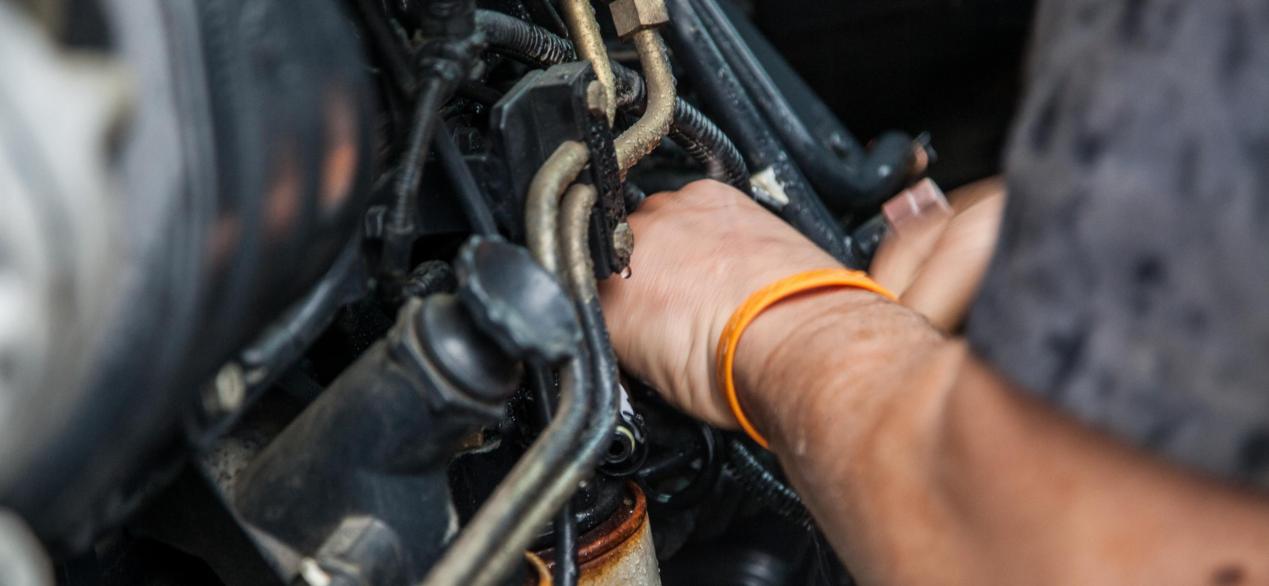 Image of student working on motor