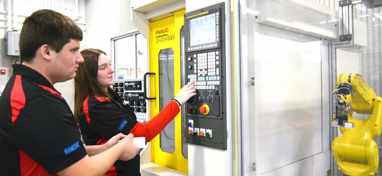 Students using a Robodrill