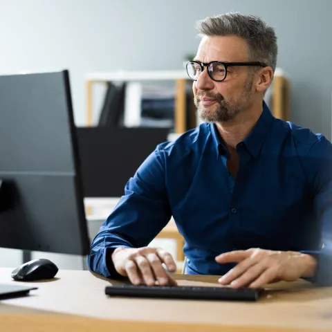 student sitting at computer