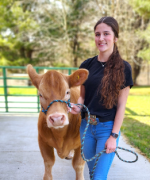 student with cow